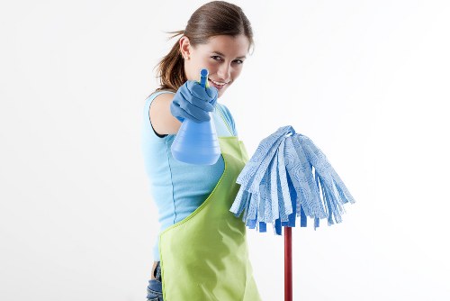 Cleaning staff checking hazard awareness and safe procedures